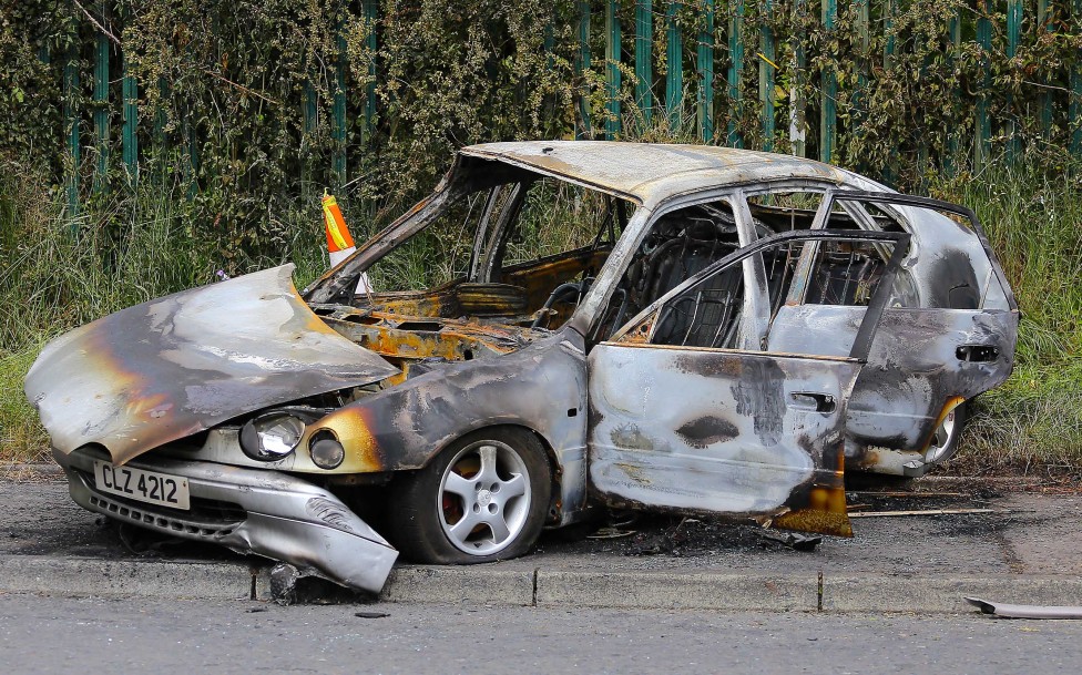 Saturday 28th June 2014 - Belfast Northern Ireland

A stolen car pictured burnt out  in the Poleglass estate following a night of "Joy Riding" on a major scale 

Picture - Kevin Scott